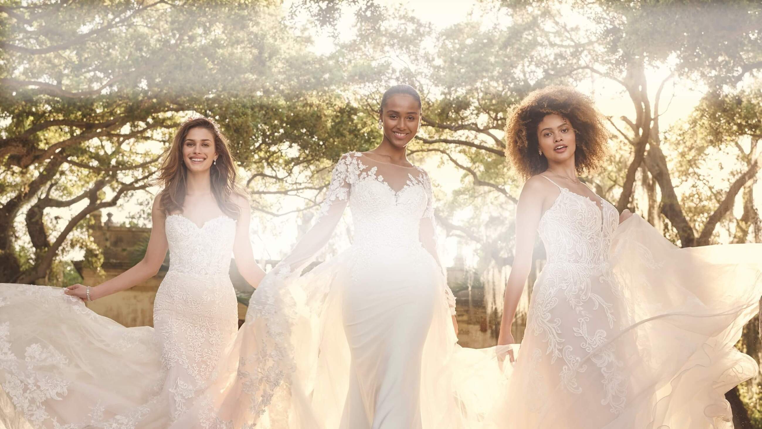 Models wearing a white gowns